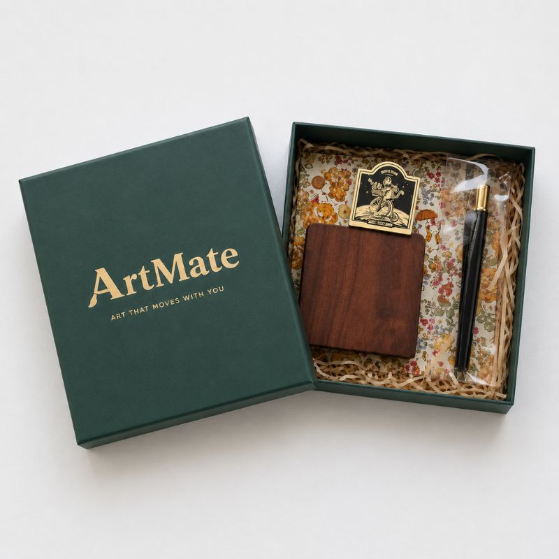 Adventure Artist Kit in a black gift box with dried flowers, brass clip, brush and floral sketchbook